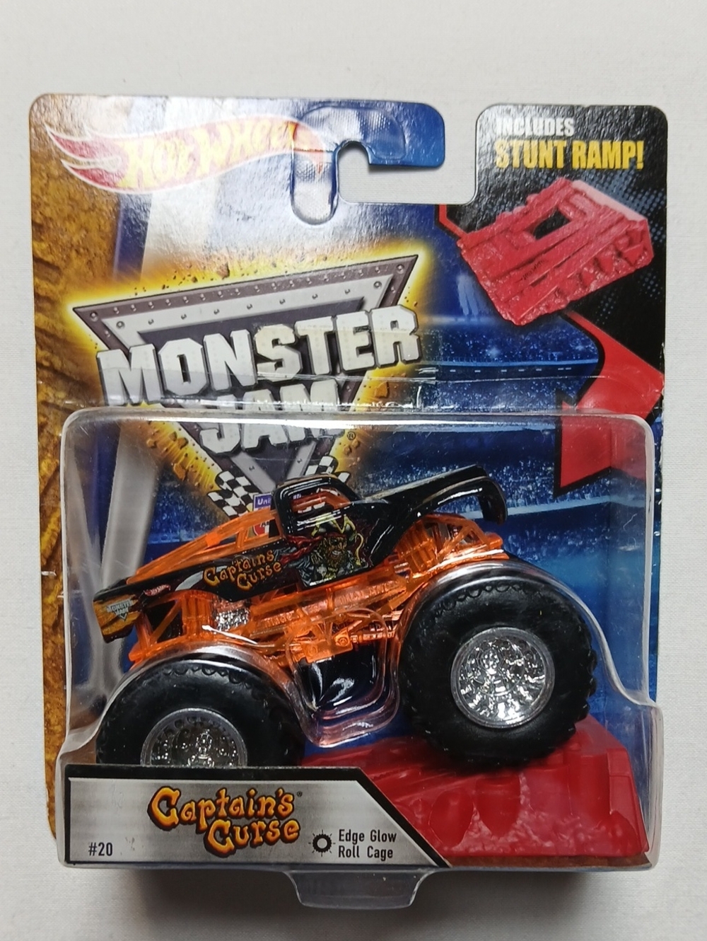 Hot Wheels Monster Jam Captain's Curse Orange Monster Truck with Red Ramp